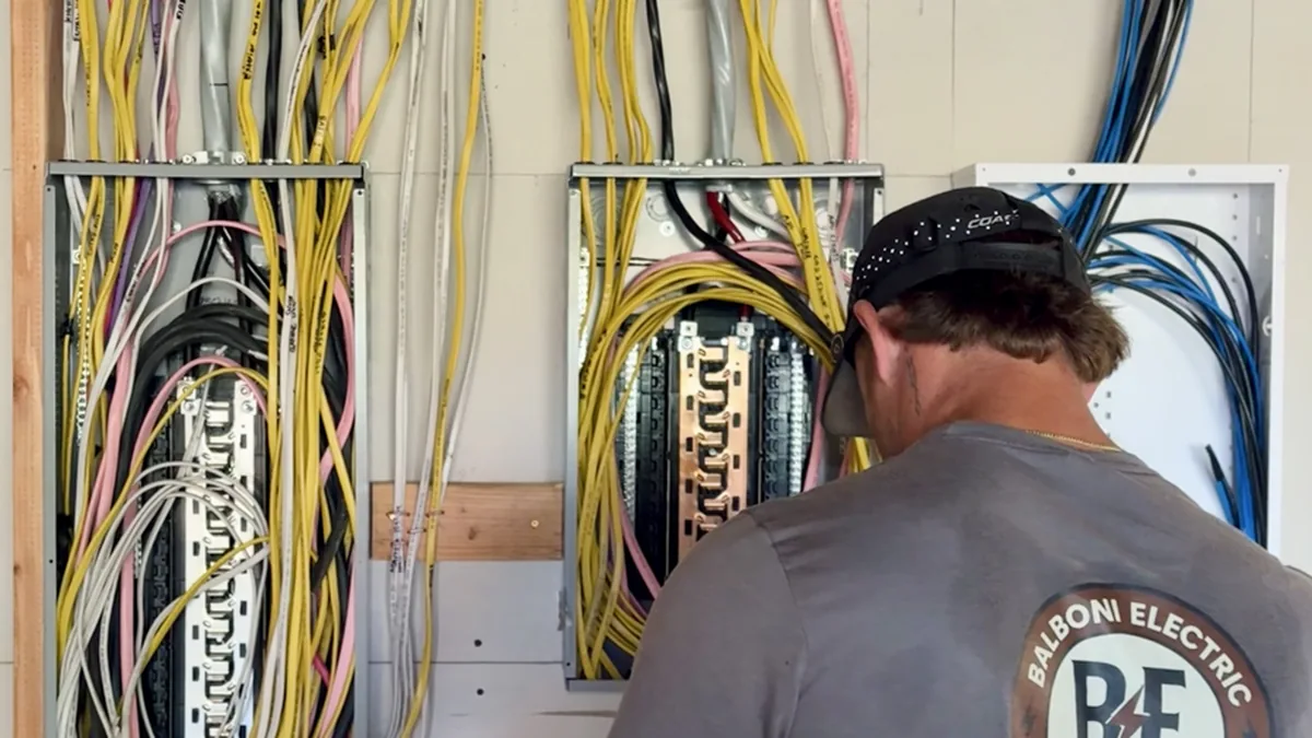 Balboni Electric technician servicing residential electrical panels