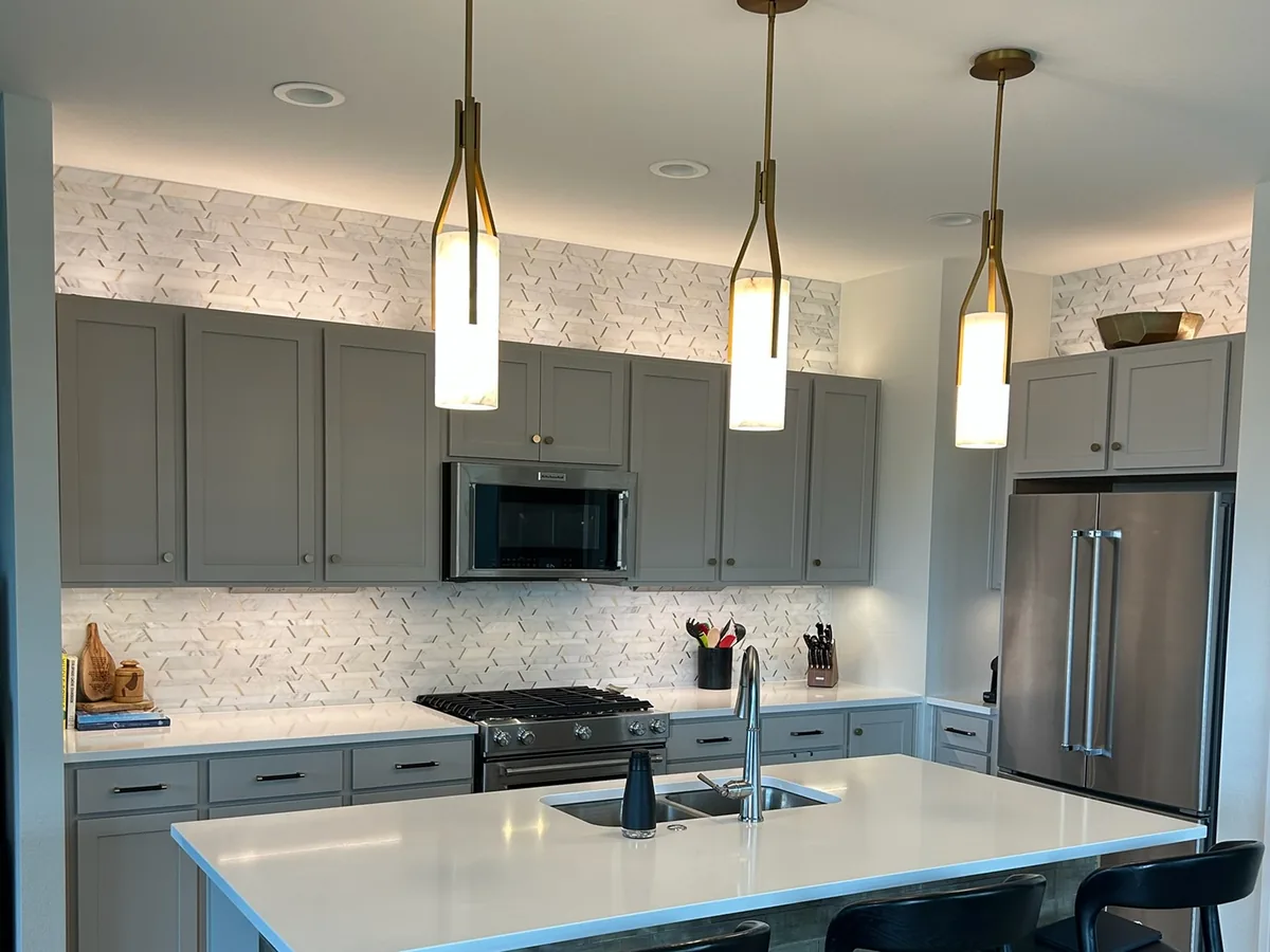 Modern kitchen remodel with island pendant lighting